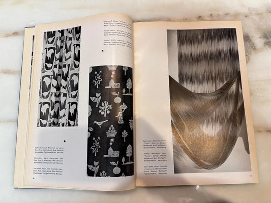 Vintage 1953 hardcover catalog titled "Dekorationsstoffe Tapeten Teppiche" published by Alexander Koch GmbH