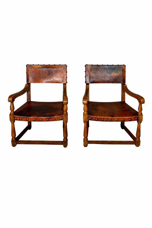 Pair of Antique Spanish Leather ArmChairs With Nailhead Detail