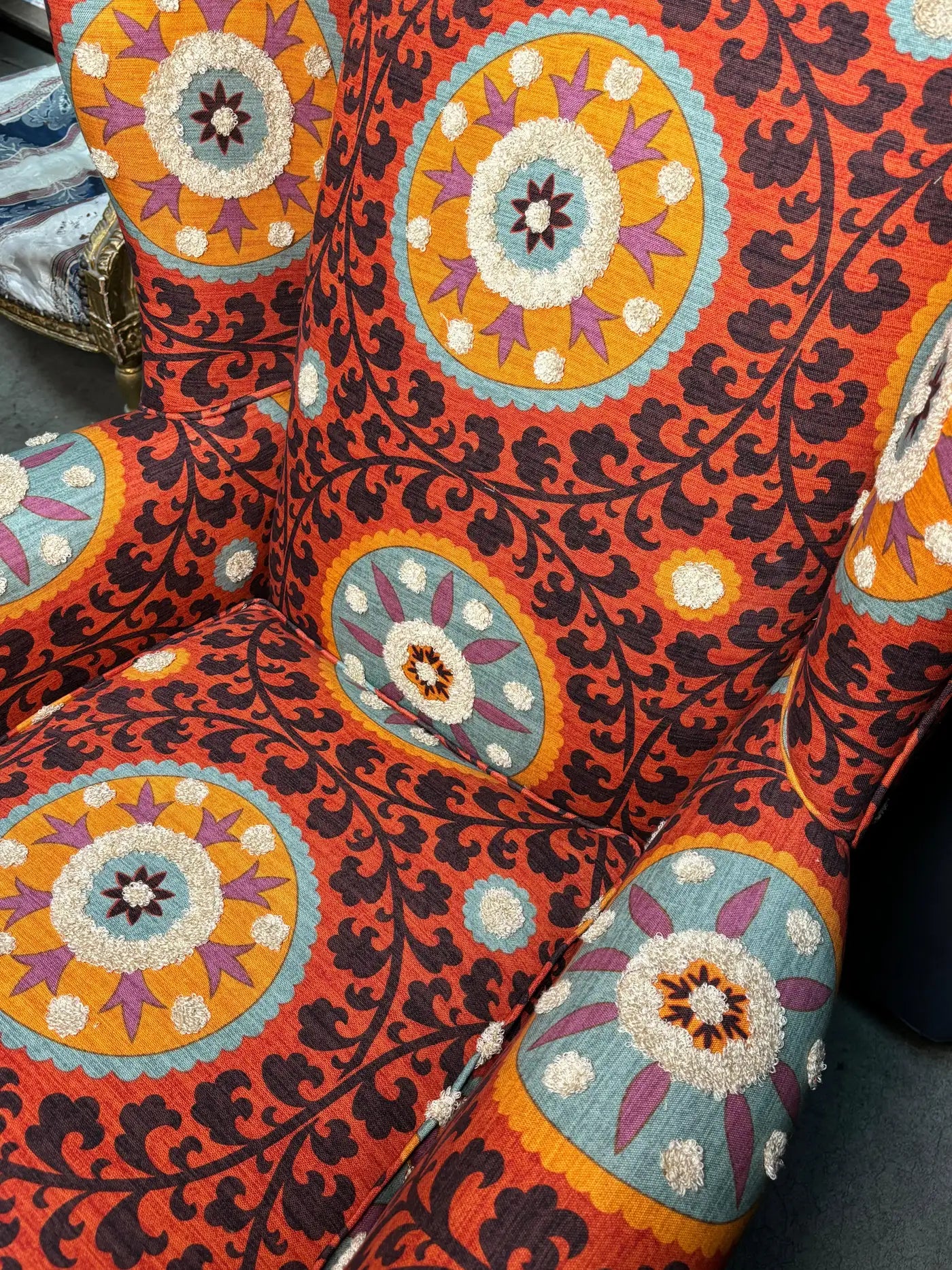 Peacock Armchair Upholstered with Tribal Thread Sunset Fabric